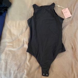 NWT Quince bodysuit black. Small. Nylon/spandex Ptp 14in -17in. Very stretchy